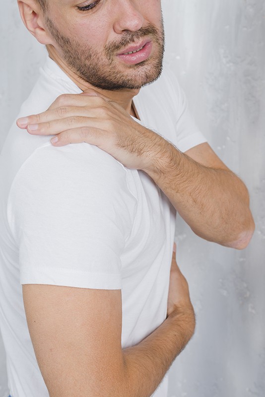 close-up-man-having-pain-his-shoulder